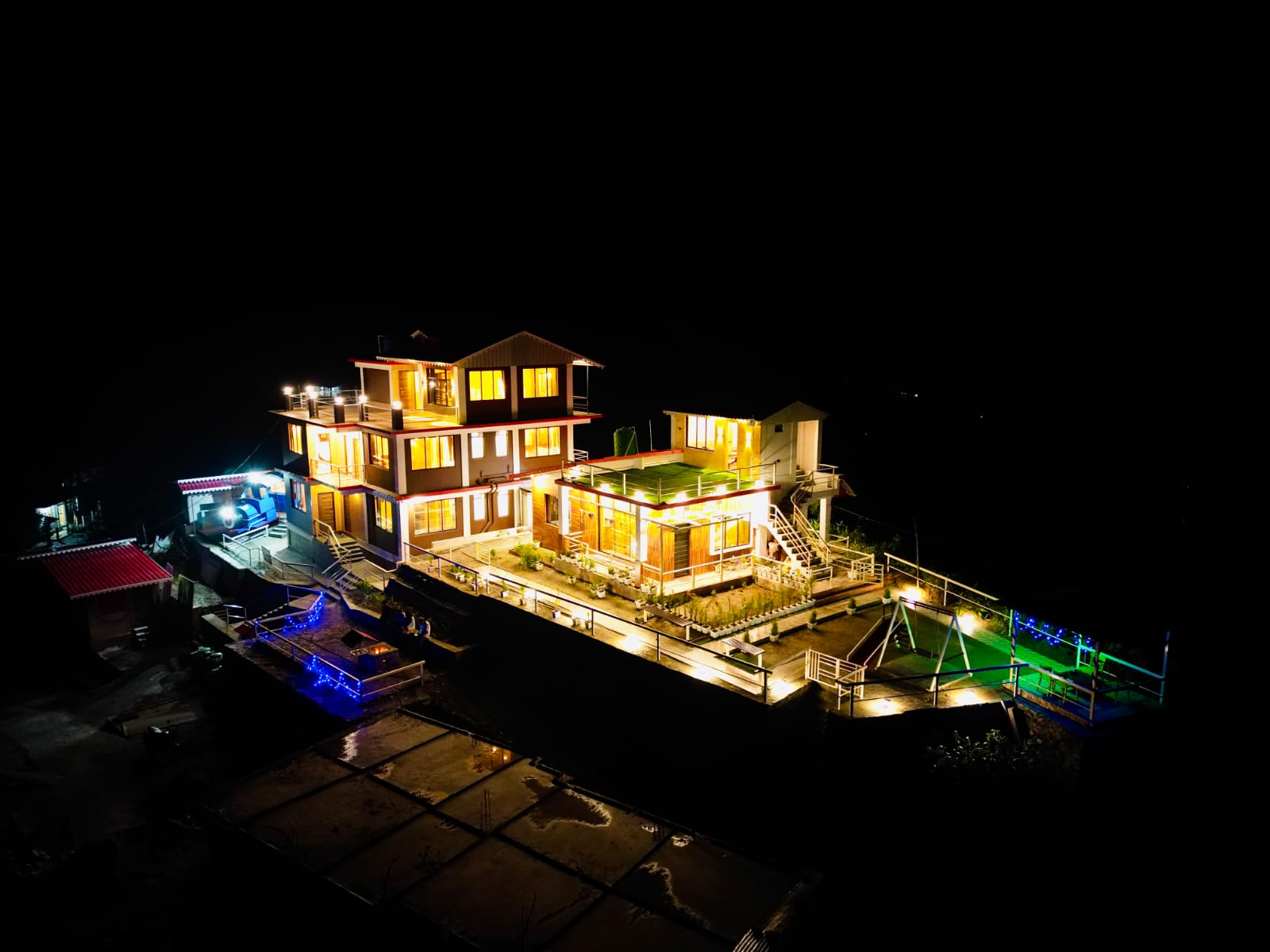 Samthar Greenery Homestay exterior at night